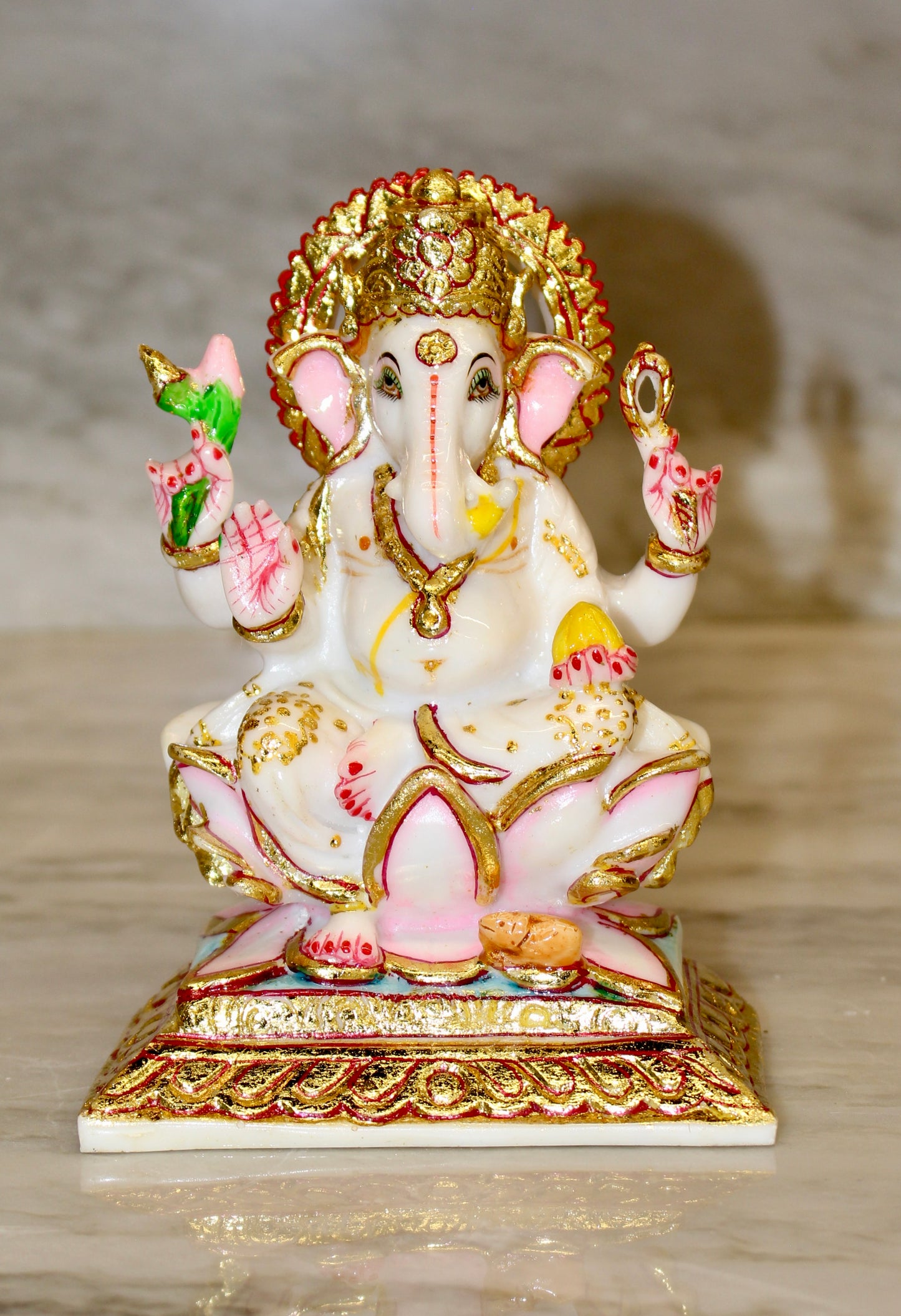 Marble-Resin Ganesha Statue with Ornate Golden Accents