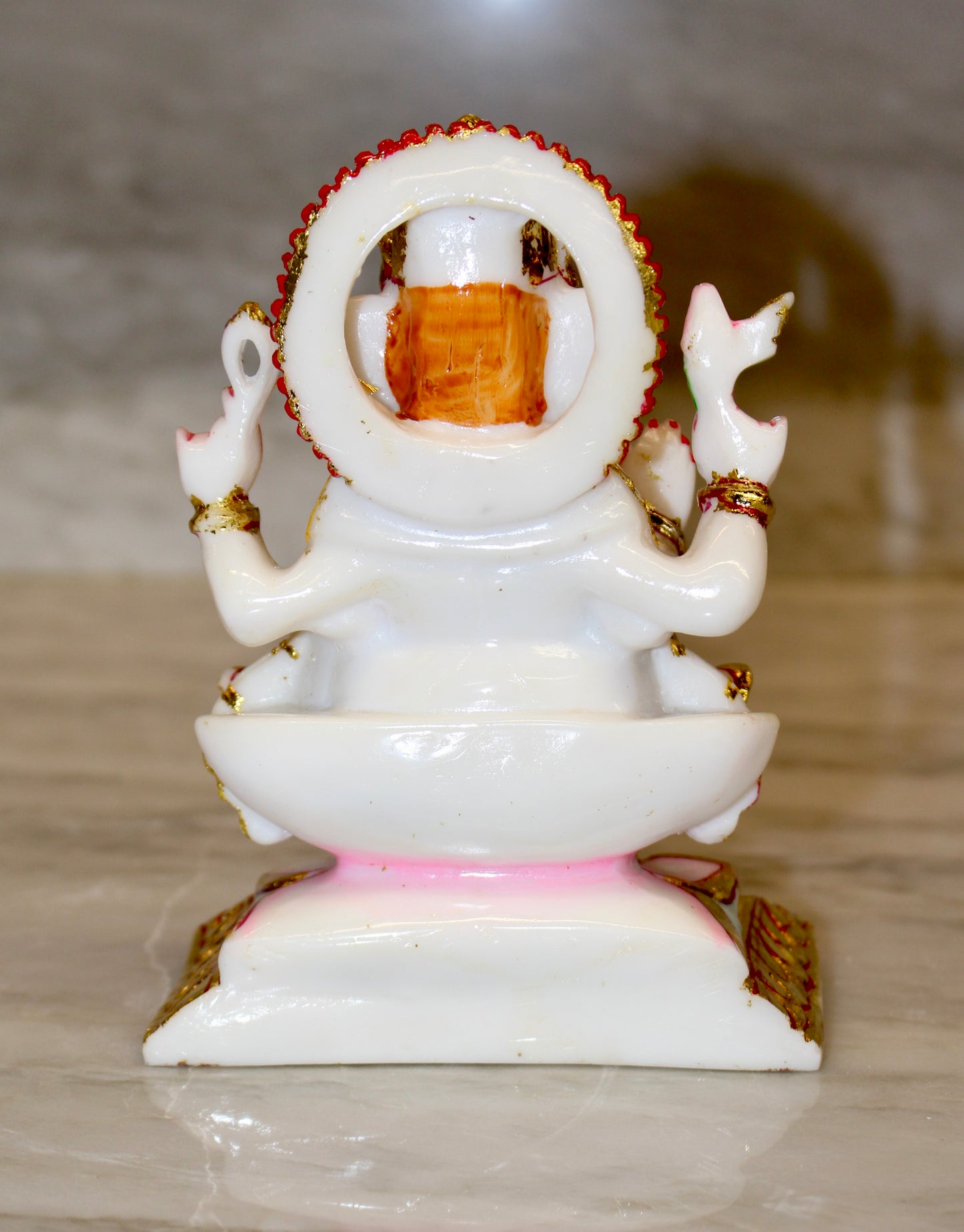 Marble-Resin Ganesha Statue with Ornate Golden Accents
